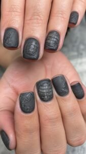 Arrange Segmented Armor Across Charcoal