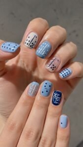 Domino Tile Light Blue Nails With Playful Dot Arrangements