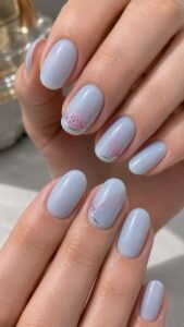 Scatter Rose Mist Across Pale Blue